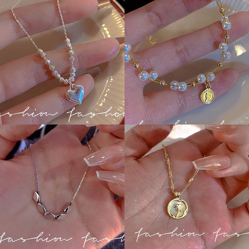 Trendy Light Luxury Pearl Heart Necklace: Versatile Beaded Clavicle Chain for Women's Style