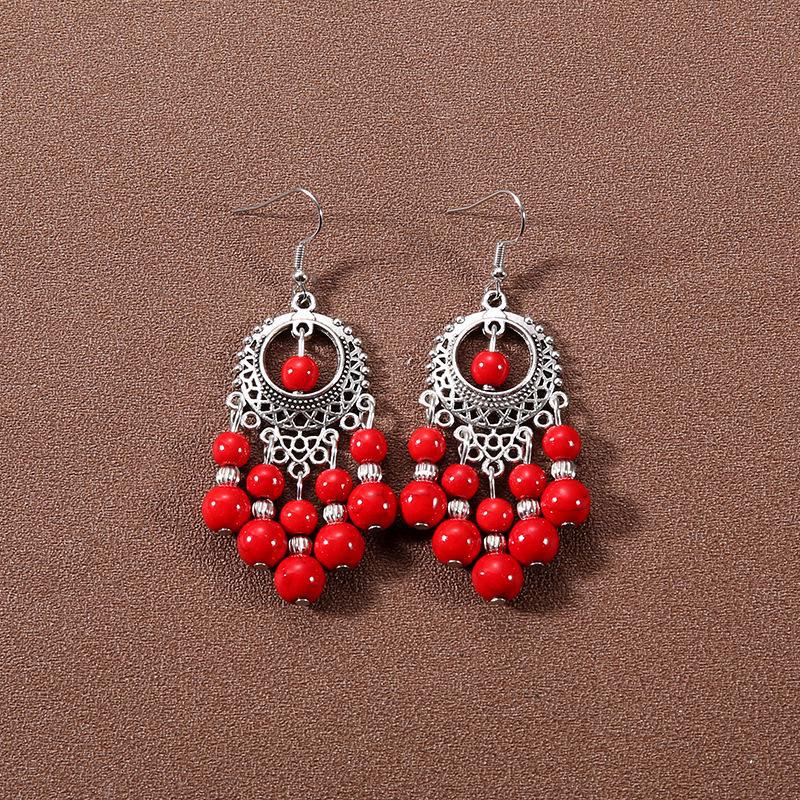 Богемные серьги-кисточки из бирюзового и красного тибетского металла с бусинами