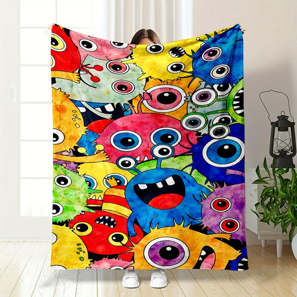 Brightly colored cartoon monsters with big round eyes and playful expressions. for all seasons blanket lunch break throw gift