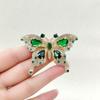 Yousheng Women Brooch Retro Butterfly Shape Faux Emerald Rhinestone Decor Anti-slip Suit Coat Collar Hat Scarf Decoration Clothes Pin