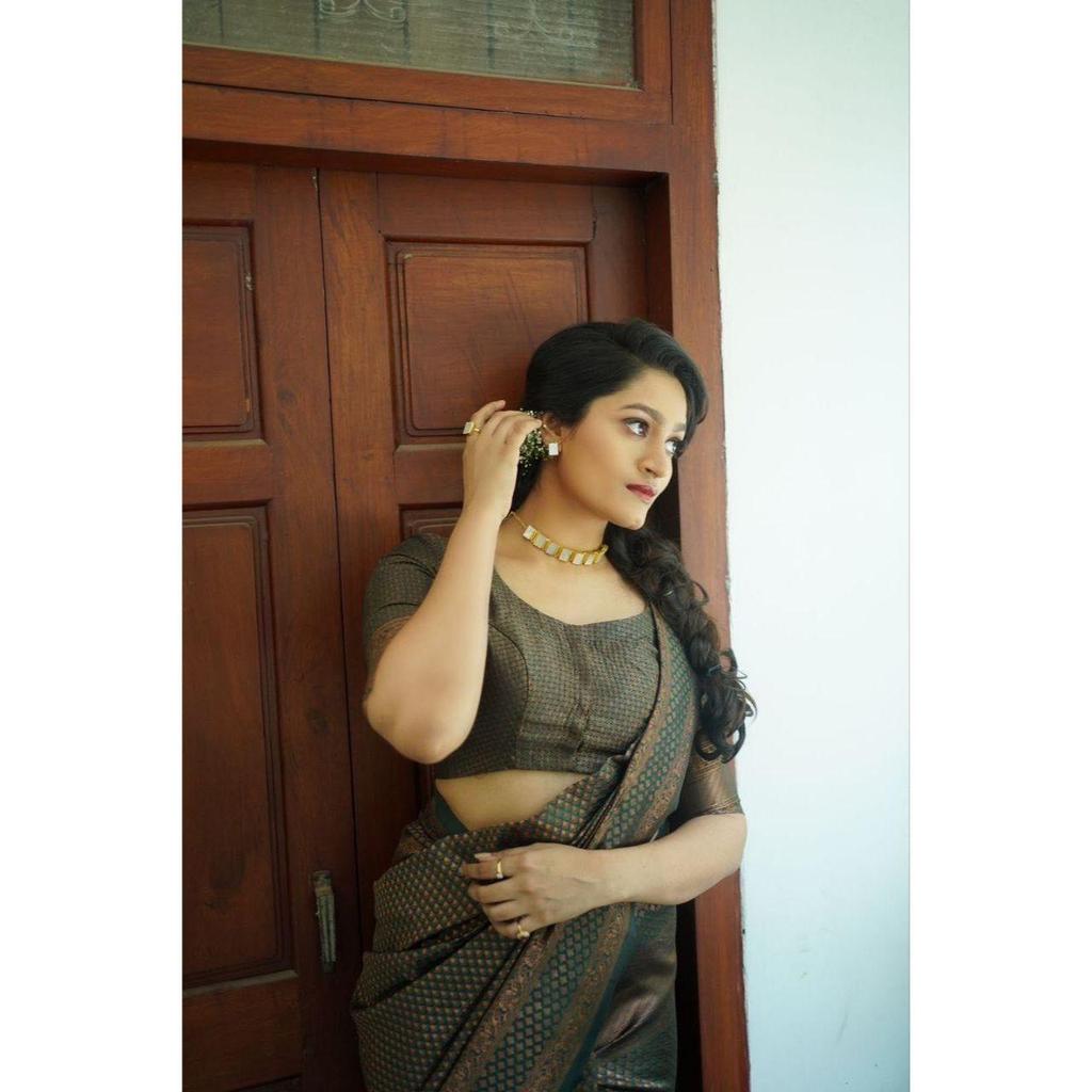 Silk Saree from the ALMAARI Store Is Adorned with Beautiful Zari Work In Form of Traditional Motifs.