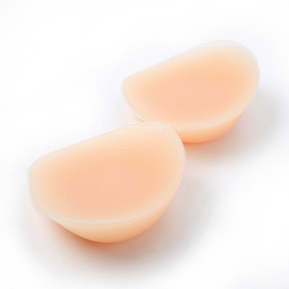 Треугольный силиконовый протез груди в тон кожи - послеоперационная вогнутая накладка на грудь