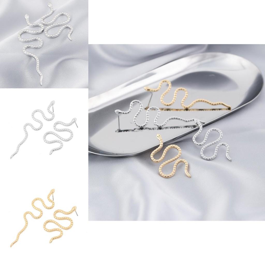 Elegant Gold And Silver Snake Earrings Modern And Fashionable Animal Inspired Jewelry