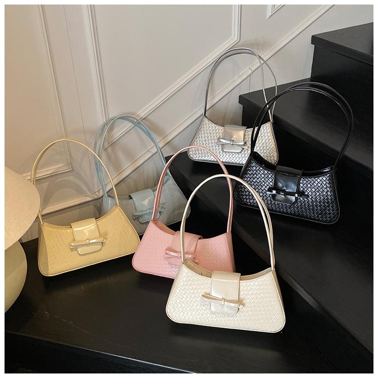 Premium sense niche bag women's 2025 new spring and summer versatile French woven portable shoulder bag underarm small square bag