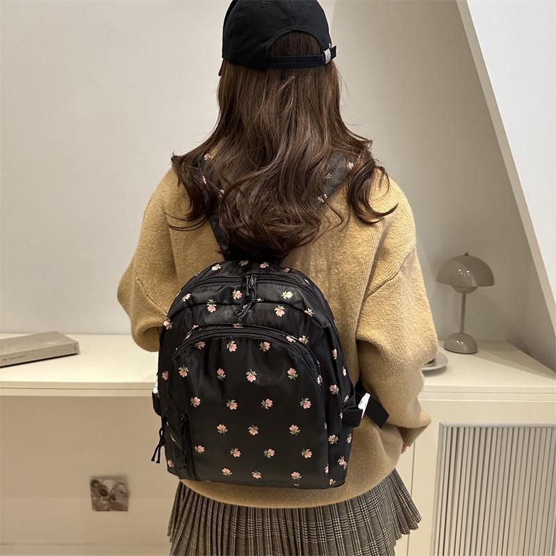 Urban Minimalist College Print Backpack With Durable Polyester And Stitching Detail For Casual Travel
