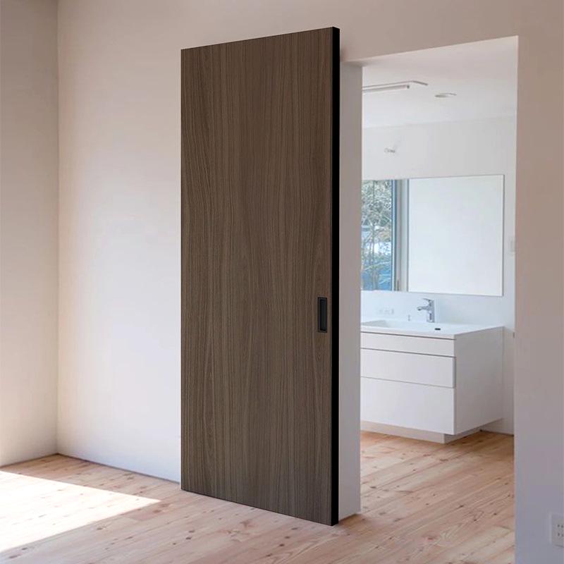 Minimalist Aluminum Wood Trackless Sliding Barn Door - Invisible, Paint-Free Design for Bedroom or Living Room.
