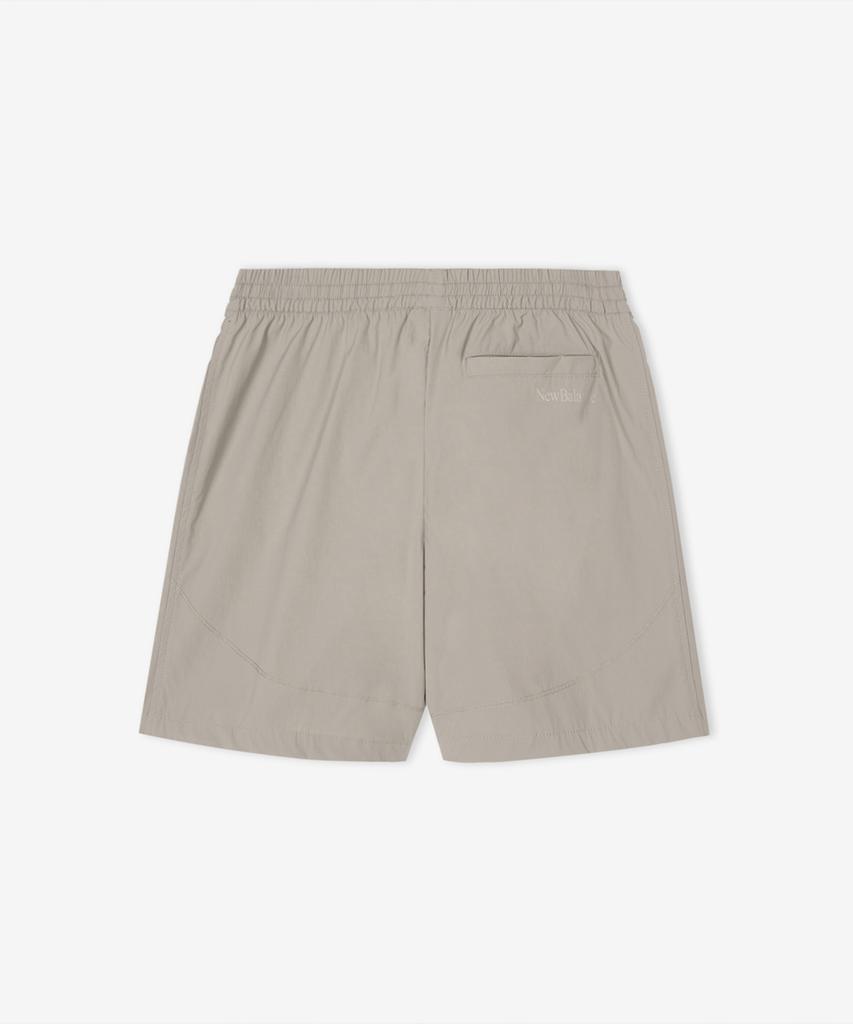 New Balance Nbnvg3W612 / Женские эластичные шорты-полубриджи Frozen Woven Stretch Essential (D/Бежевый)