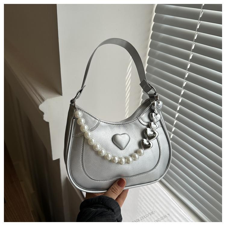 Жемчужная сумочка женская 2024 новая трендовая корейская нишевая сумка подмышку премиальная иностранная сумка-мессенджер сумка на плечо