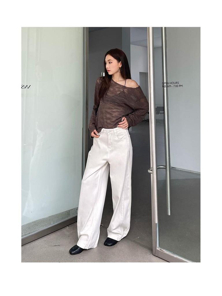 Женские джинсы цвета экрю с высокой посадкой в стиле ретро и широкими штанинами, осень/зима 2025: Свободные, стройнящие брюки прямого кроя длиной до пола.