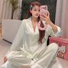 Spring and summer thin ice silk pajamas women's long-sleeved trousers sweet girl age-reducing pearl silk loungewear explosion