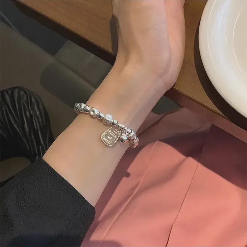 Elegant Niche Silver Bracelet with Concave Square Beads - High-End Luxurious Design