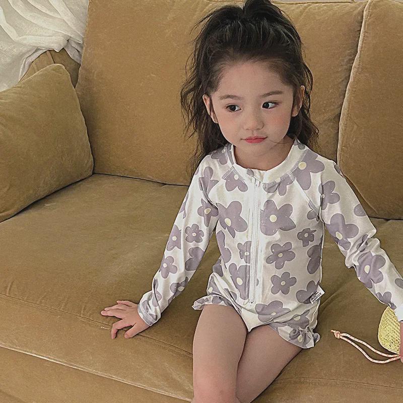 Stylish Floral Long-Sleeve Girls' Swimsuit with Sun Protection for Beach or Hot Spring Vacations