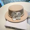 French retro elegant temperament pearl flower woolen hat girls autumn and winter fashion versatile street shot flat top hat