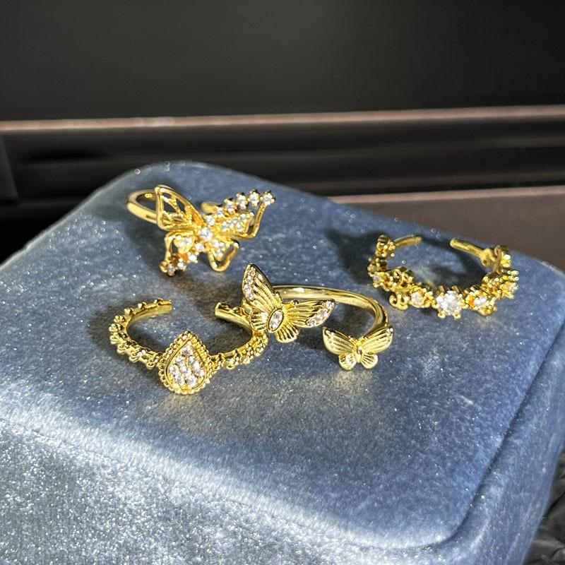 Retro butterfly geometric water drop slightly inlaid court style open ring female niche design sense light luxury versatile ring tide