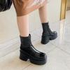 Черные кожаные ботинки Dr. Martens: Короткий голенище, Платформа с толстой подошвой, Высокий каблук, Повседневный дизайн на танкетке.