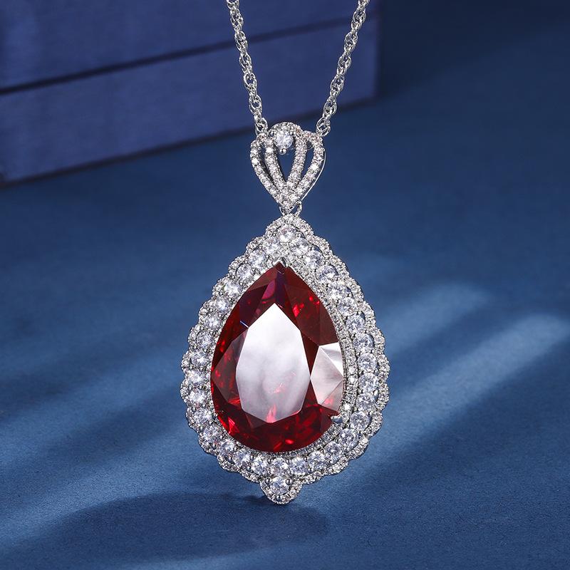 Ювелирные изделия Медное основание с золотым покрытием Имитация цвета Сокровище Большой кулон в виде капли воды Роскошная инкрустация Главный камень 18 * 25