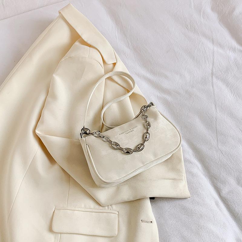 Маленькая сумка Niche Design с нежной текстурой и цепочкой для женщин. Весной новая модная и модная маленькая квадратная сумка через плечо для женщин.