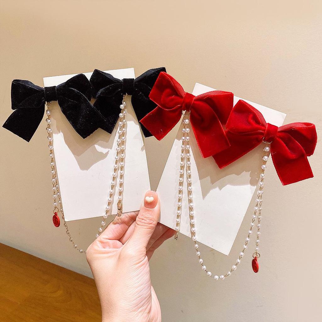 Красная новогодняя заколка-бантик с жемчужной кисточкой для девочек