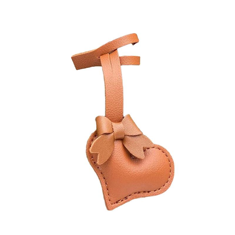 1 шт. Подарочный держатель для ключей из искусственной кожи в форме сердца, брелок для ключей, модные бирки для багажа, подвеска в виде банта на сумку для женщин, подвески с пряжкой