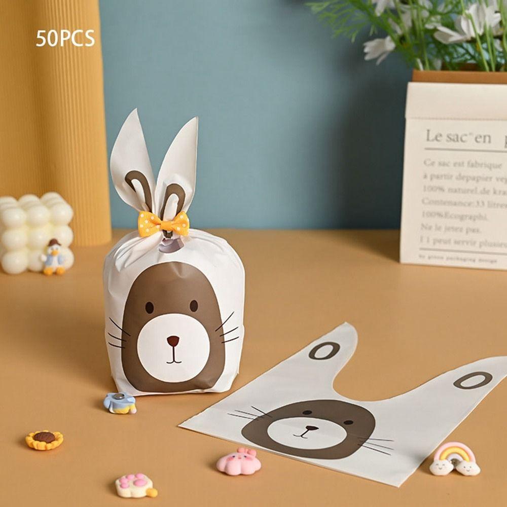 50 шт. Новые пасхальные картонные мешочки с ушками кролика, пластиковые мешочки для конфет в виде животных для детей, упаковка для печенья на день рождения, подарки своими руками