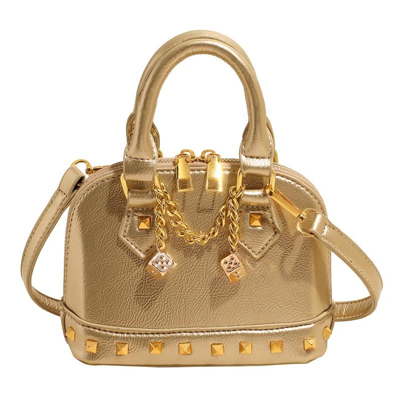 Минималистичная сумка-ракушка для женщин из искусственной кожи с металлическими заклепками, повседневная кроссбоди для весенних нарядов