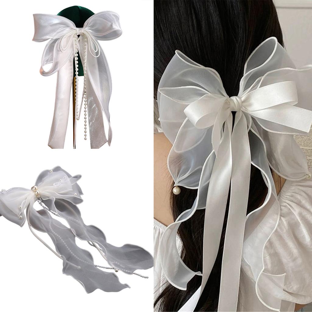 Нежная заколка для волос в виде вуали с бантом и бусинами. Добавьте нотку изысканности в свою прическу с помощью нежной заколки для волос.