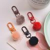 Colorful Milk Pendant Plush Ball Keychain with Macaron Shade and Revolving Buckle.