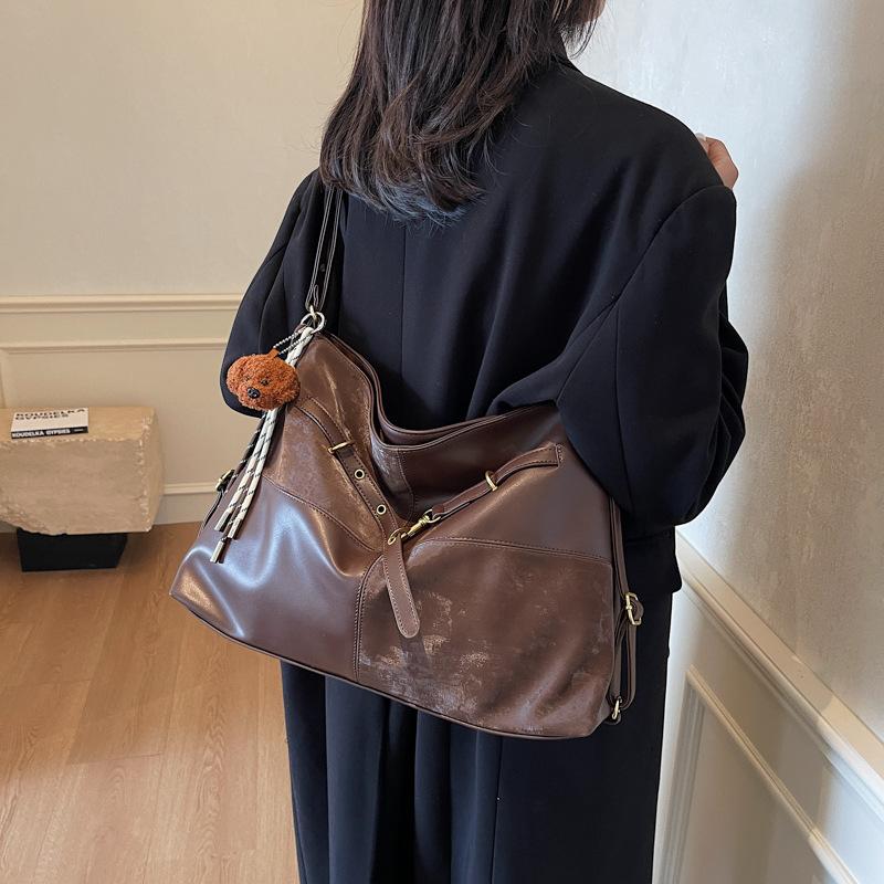 Ретро сумка большой вместимости женская 2025 новая универсальная повседневная сумка-тоут многофункциональный рюкзак для поездок