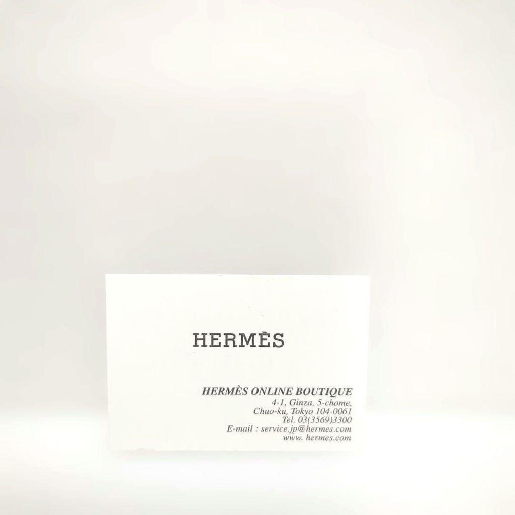 Б/у аксессуар-шарм для обуви HERMES Petit h, двусторонний
