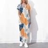 Women Plus Size Printed Scrub Set Crisscross Cutout Neck Short Sleeve Pocket Top Long Pants Two Piece