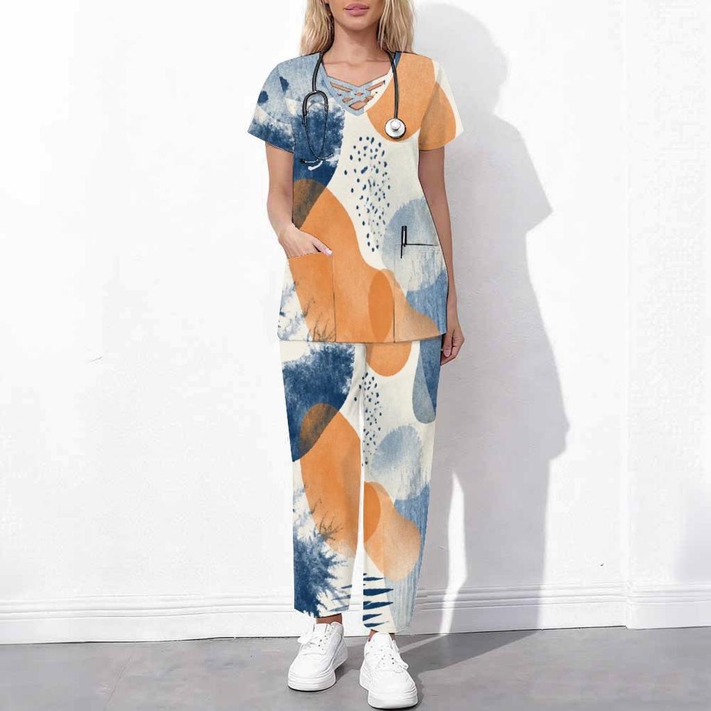 Women Plus Size Printed Scrub Set Crisscross Cutout Neck Short Sleeve Pocket Top Long Pants Two Piece