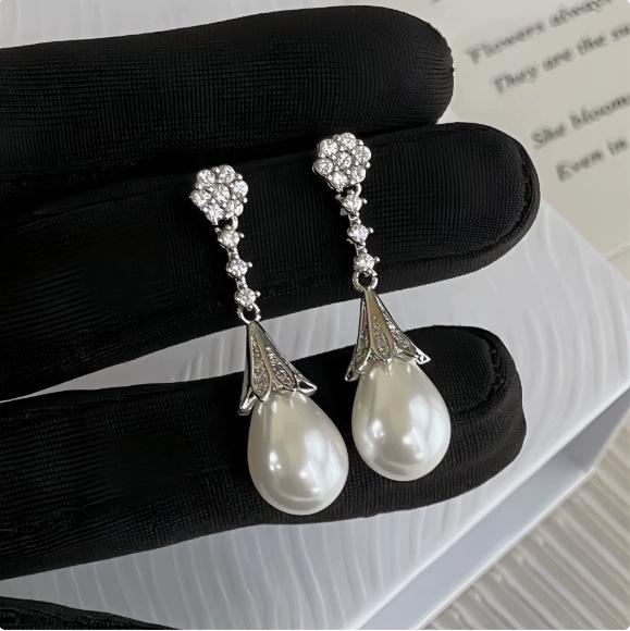 Серебряные серьги-кисточки с жемчугом и иглами - модные универсальные женские украшения