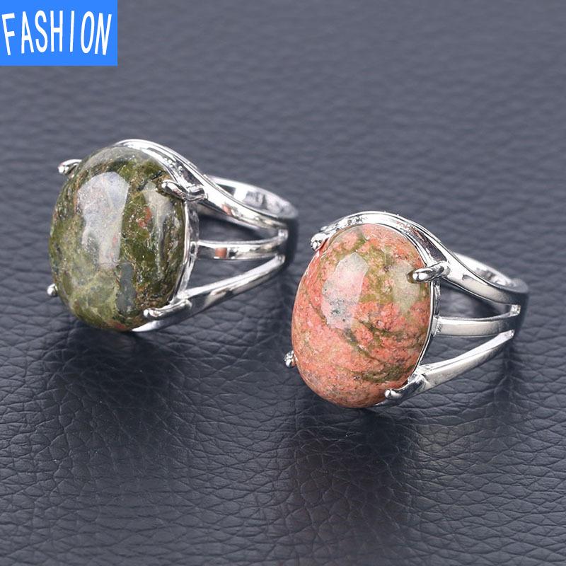 Oval Natural Crystal Four-claw Inlaid Hollow Ring