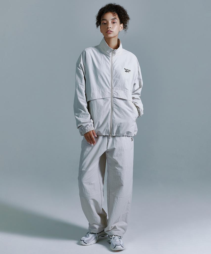 Reebok Теплые штаны Essentials - Бежевые