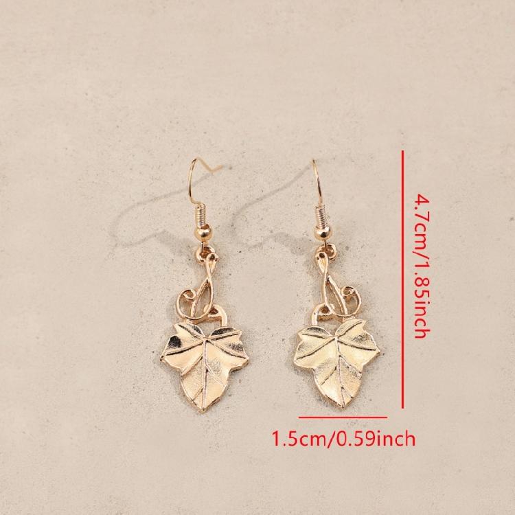 Ретро-вдохновленные серьги-подвески с кленовыми листьями и деталями в виде капель масла. Портативные для дополнения модных образов.