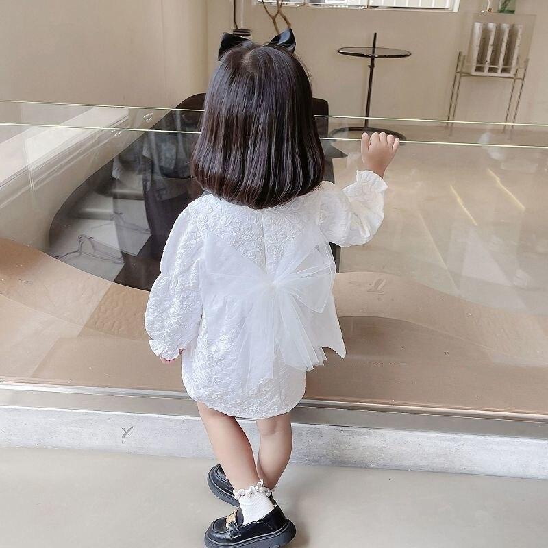 Девушка в западном стиле, сладкое жаккардовое платье с длинными рукавами и бантом