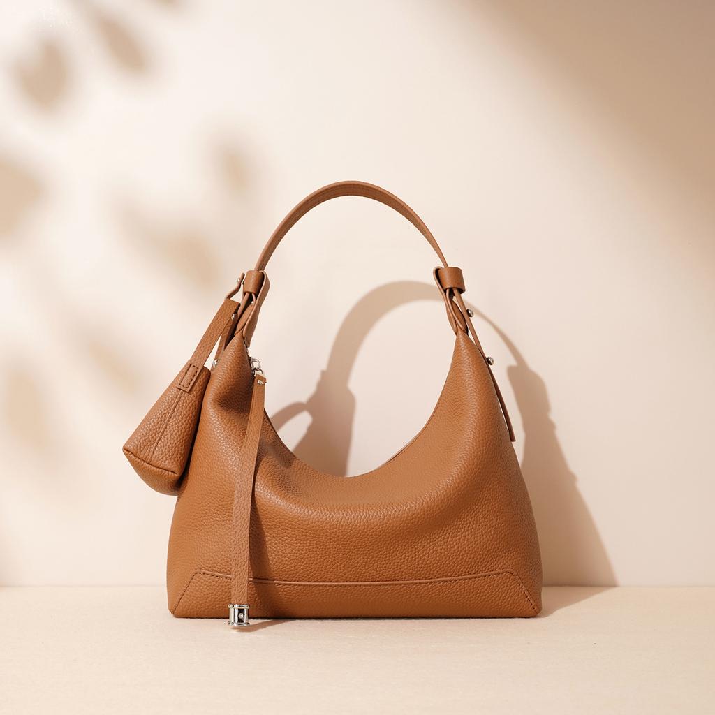 2025 New Series Lunch Box Bag Niche Armpit Stick Bag Grade Leather Shoulder Bag Crossbody Bag Women's Bag