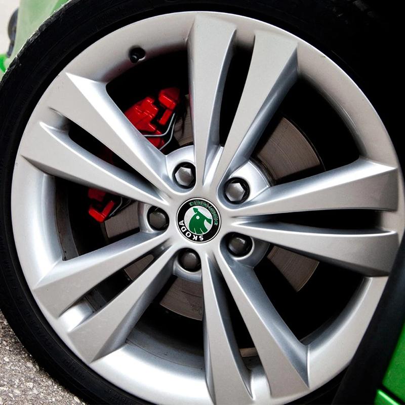 2025 Новые 4 шт. 55/65 мм Автомобильный значок Колпачки центральных ступиц колес Для Skoda Octavia Kodiaq Enyaq iV Kamiq Scala Superb Fabia Yeti Vi