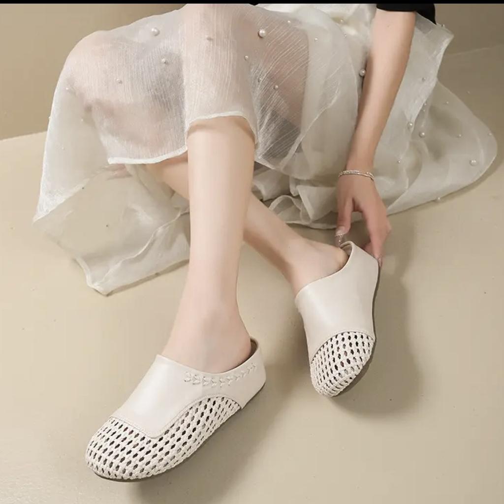Retro flat-bottomed bag head wearing cool slippers women's 2025 summer height increase hollow half slippers woven breathable shoes