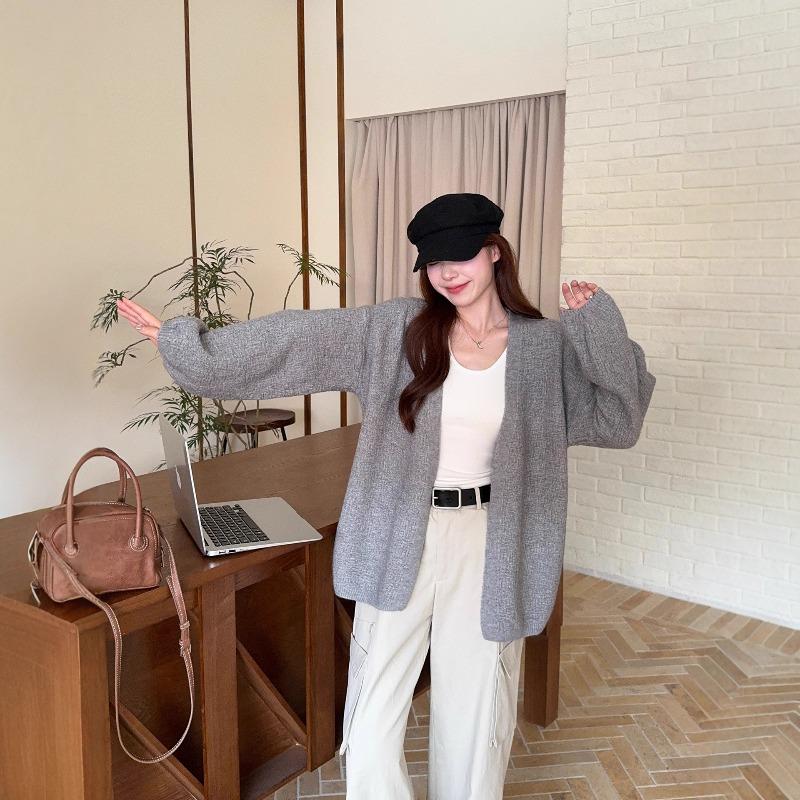 Autumn and winter new lazy style bark pattern fashionable versatile loose medium and long bubble sleeve knitted sweater jacket women
