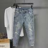 Men's Slim Elastic Nine-Hole Ripped Jeans Pencil Pants