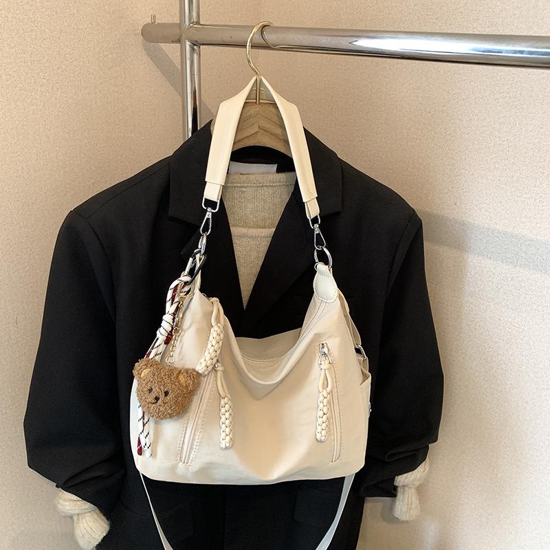 Премиальная повседневная сумка-мессенджер женская лето 2025 новая большая вместительная сумка для поездок на работу нишевая одноплечевая подмышечная сумка-тоут