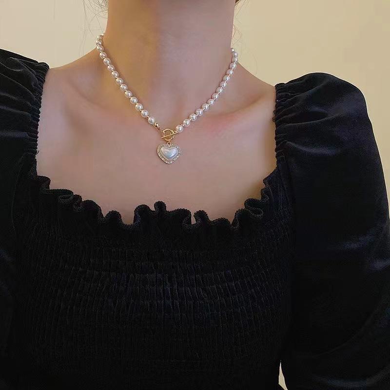 New super fairy temperament imitation pearl love necklace in Japan and South Korea, cold wind, sweet and simple OT buckle collarbone chain woman