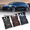 Ящик для хранения вещей в центральной консоли Tesla Model 3
