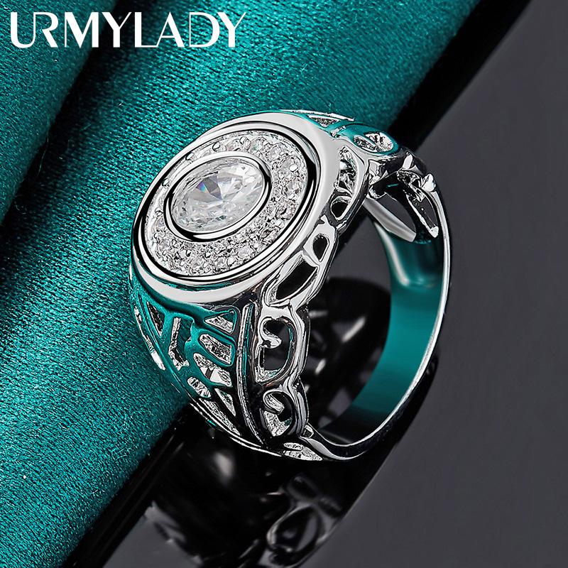 Серебряное кольцо в форме часов с фианитами