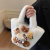 Cute plush bucket bag female new autumn and winter out hand fluffy small bag cartoon fluffy bag