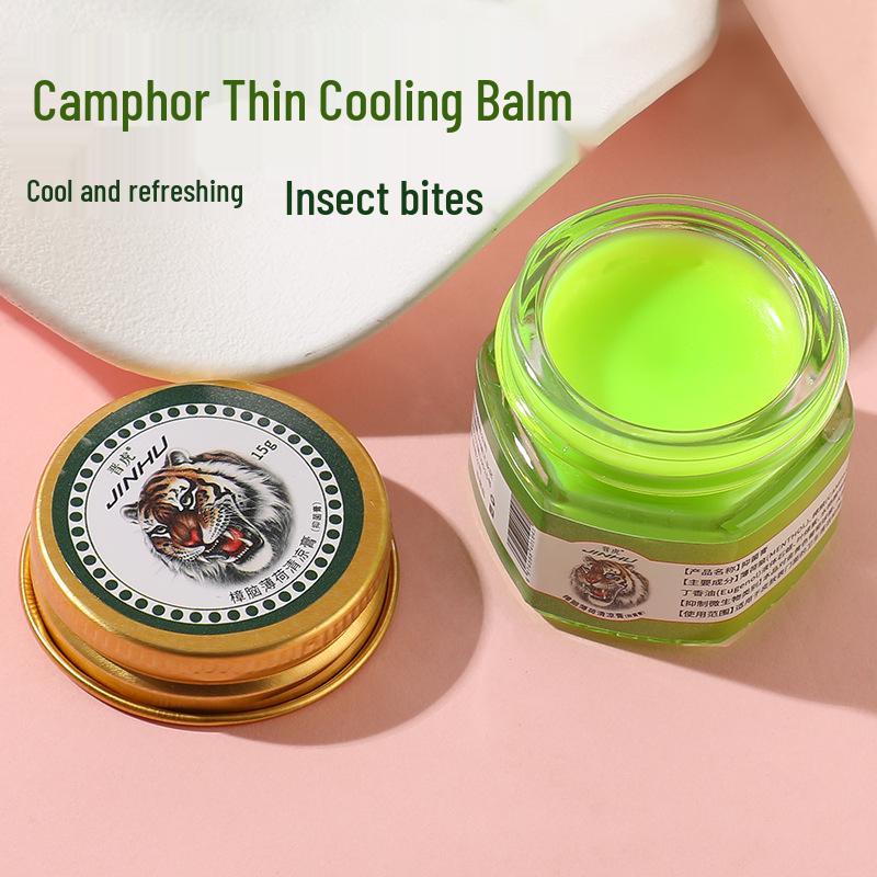 Jin Hu Tiger Wan Heating Balm 19g - Invigorating Mint Scent for Motion Sickness Relief and Deep Penetrating Comfort.