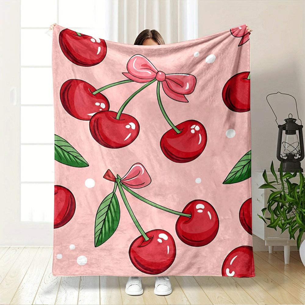 Red cherries with green stems and leaves, pink bows, on soft pink background. for all seasons blanket lunch break throw gift