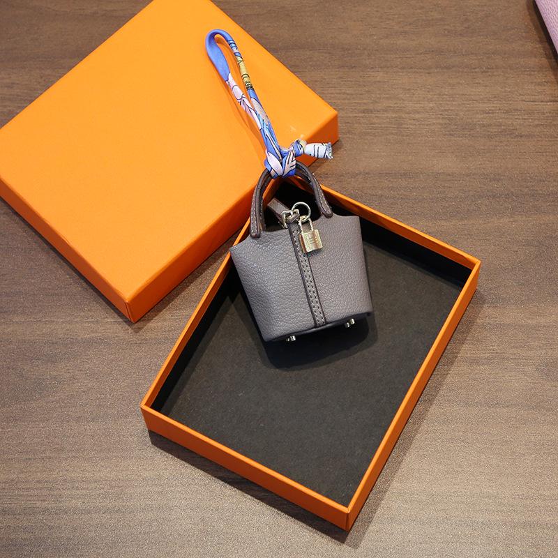 Стильный кожаный брелок и аксессуар для сумки для наушников - Милая и креативная женская модная подвеска