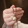 New model of auspicious golden gourd pendant necklace in traditional Chinese style, long gourd necklace for women, sweater chain, ladies' accessory
